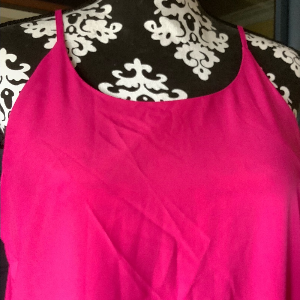 Hot pink high low spaghetti strap dress.
